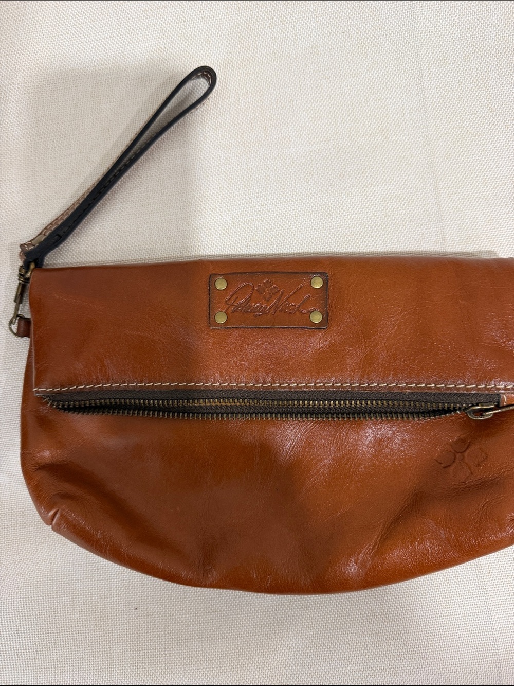Patricia Nash Leather Wristlet Clutch in Cognac Brown